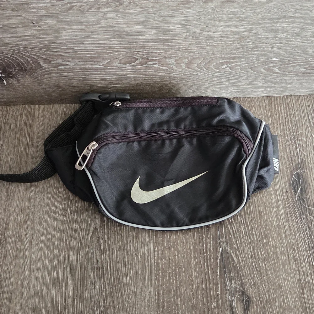 Nike Black Waist Bag with White Swoosh and Reflective Trim